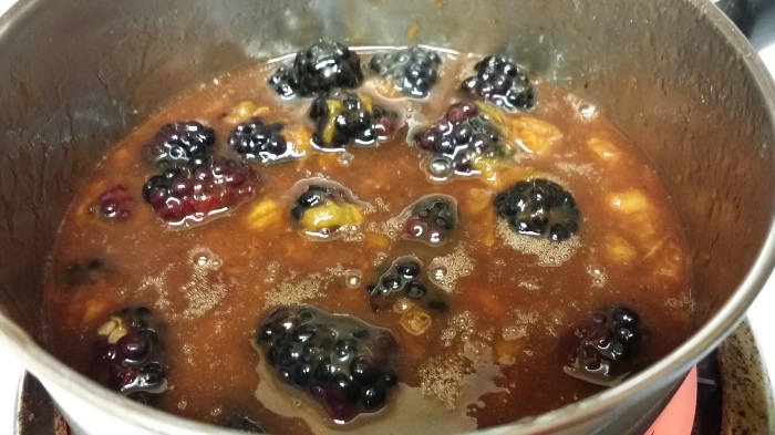 Fruit and caramel stirred together over low heat.